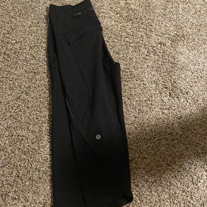 lululemon black cropped leggings with mesh details and pockets
